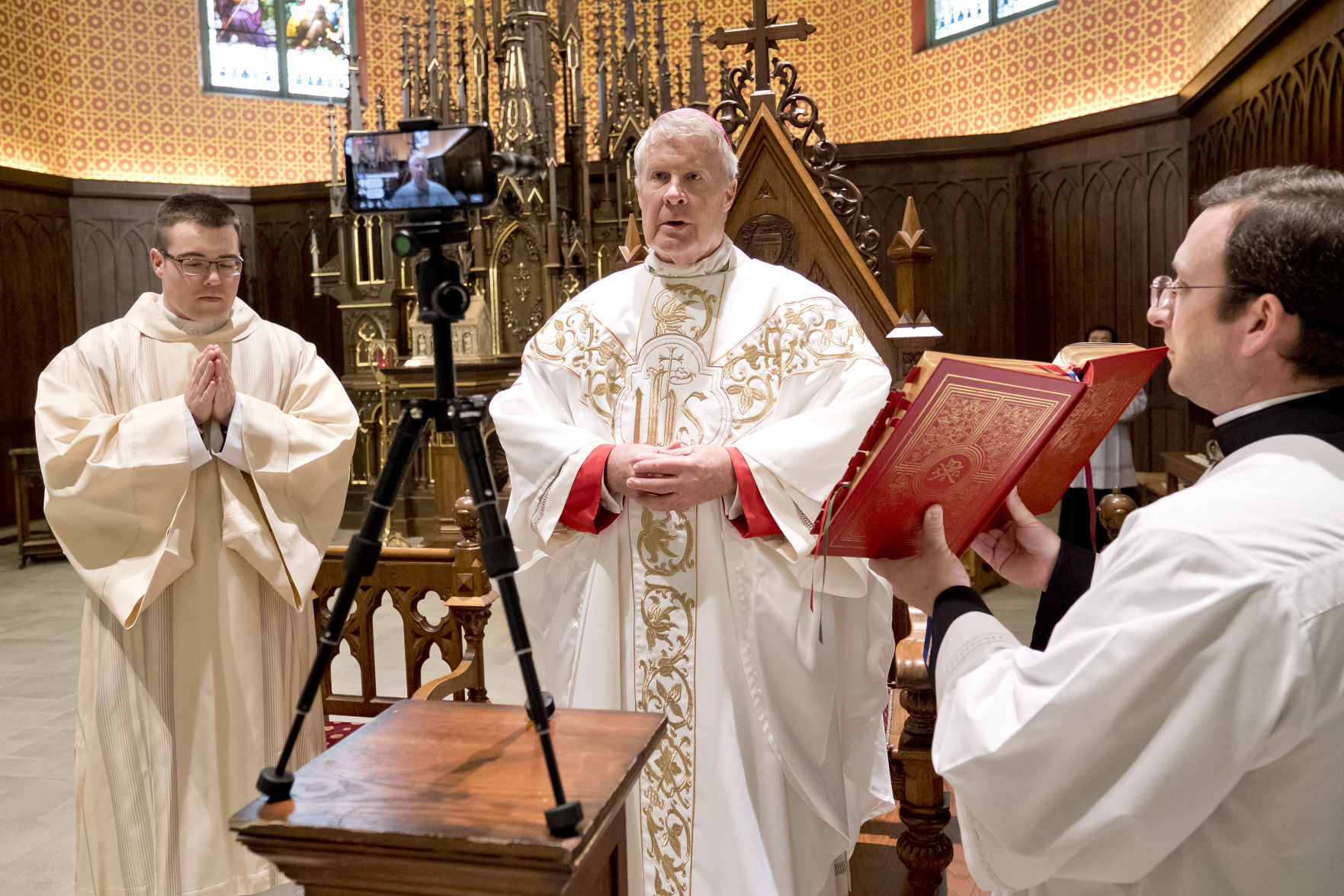 COVID-19 Catholic mass is live streamed on Holy Thursday